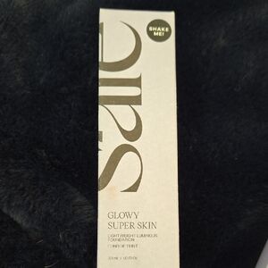 Saie Glowy Super Skin Foundation - Elegant Black Packaging